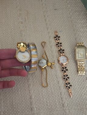 A Set Of 4 Gold Watches